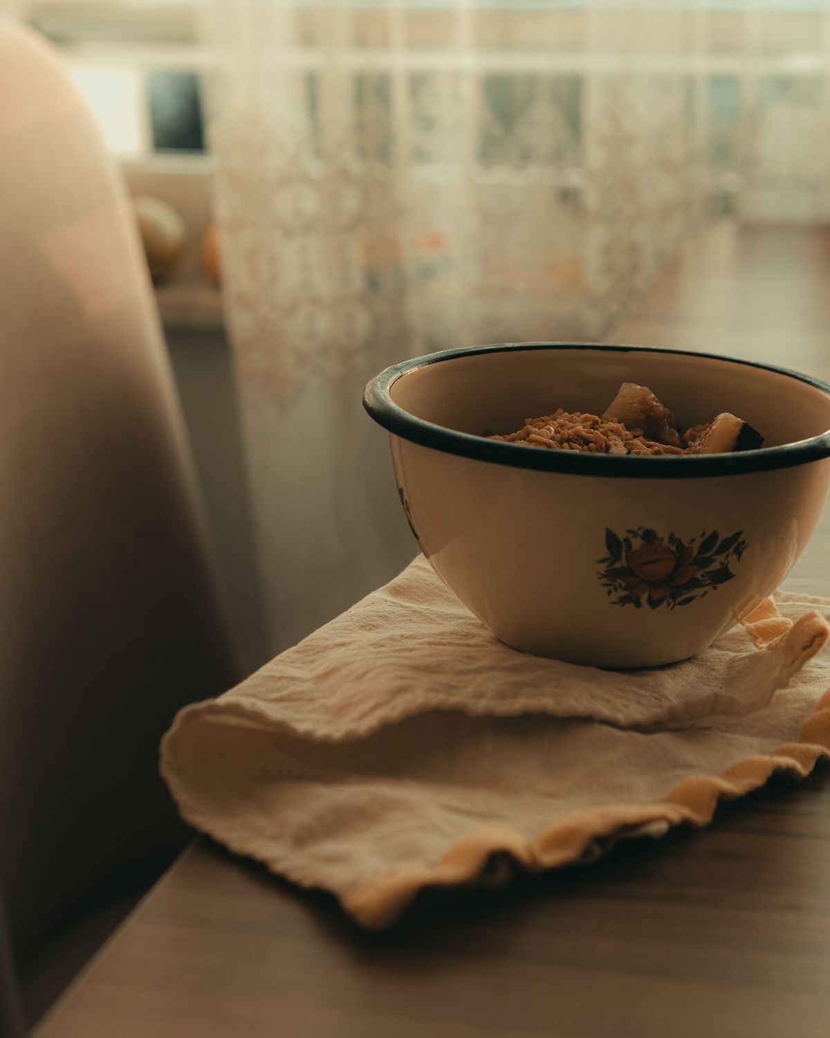 Morning light falling across a well-loved family kitchen table